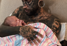 24-year-old dad, whose body is completely covered with over 200 tattoos removed them for the sake of his baby daughter … and you better take a seat before  Erased His Past For One Small Reason